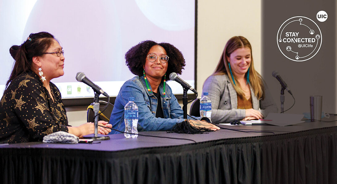 Three women of various ethnicities on a panel.