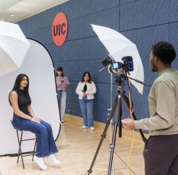 Student is getting a professional headshot taken at UIC Illinois Room
                  