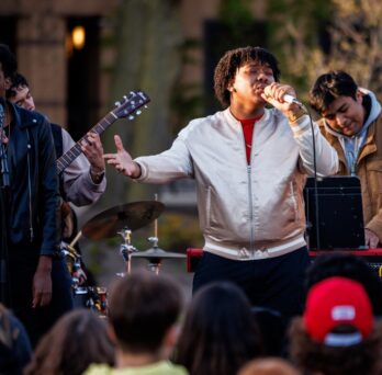 Crowd enjoys a musical performance at Battle of the Bands 2024 at UIC
                  